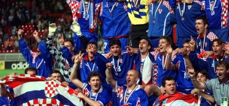 The Croatian soccer team celebrate after winning the soccer World Cup 98 third-place playoff match against the Netherlands 2-1 at the Parc des Princes in Paris Saturday July 11, 1998. (AP Photo/Luca Bruno)